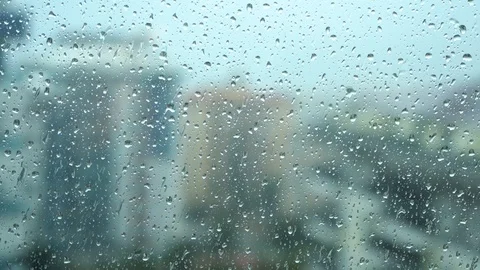 Rain days, heavy rain falling on window surface Stock Footage 104056690