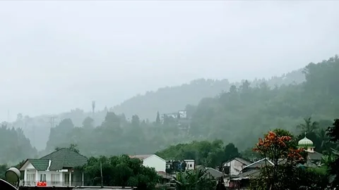 Rain in down of hill village Stock Footage 221174591