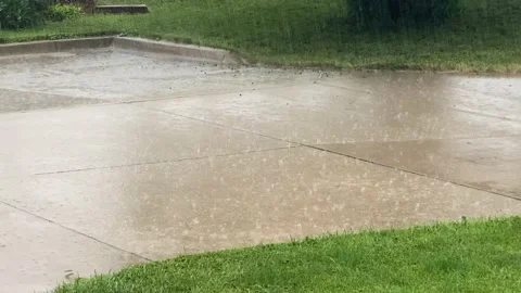 Rain Downpour on a Driveway - Thunder Stock Footage 200550553