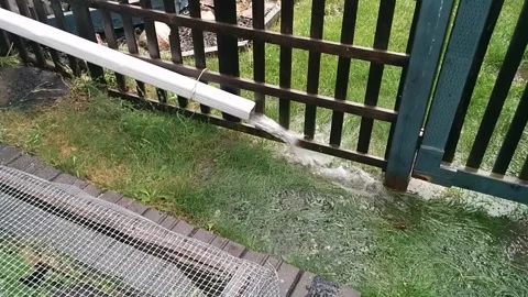 Rain downspout gushing Stock Footage 168911675