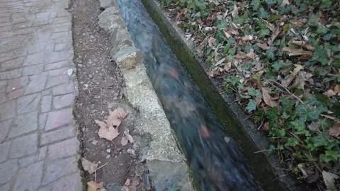Rain drain. Rainwater runoff, ditch. Stock Footage 266451473