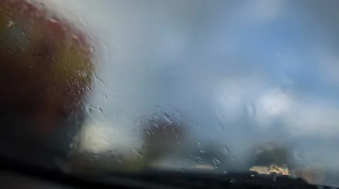 Rain dripping on the car windscreen Stock Footage 67457147