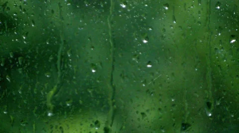 Rain Dripping down Window during Stormy Weather Stock Footage 32517376