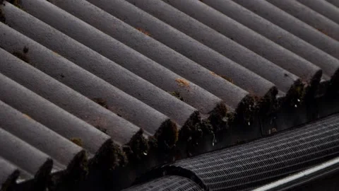 Rain dripping from a roof Stock Footage 132657550