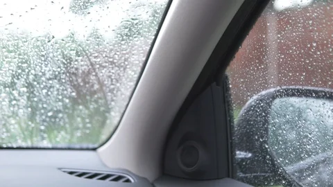 Rain dripping on the windshield of the car window Stock Footage 110872382