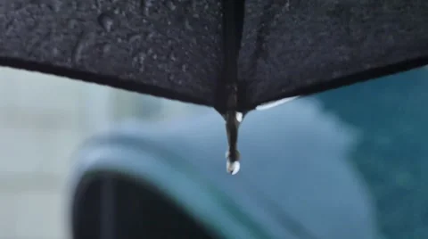 Rain drips and splashes of scatters in the telephone booth close up shot Stockbeeldmateriaal 68751538
