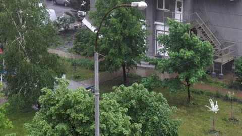 Rain drips in the city courtyard. Stock Footage 154744779
