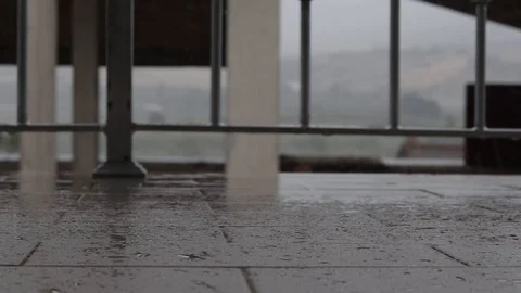Rain drop and splash on balcony. Relax feelings. Urban environment Stock Footage 91026850