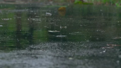Rain drop on cement floor. Rain drop on concrete floor. Stockbeeldmateriaal 232942168