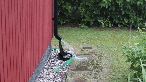 Rain drop down on downspout in rainy day Stock Footage 111623653