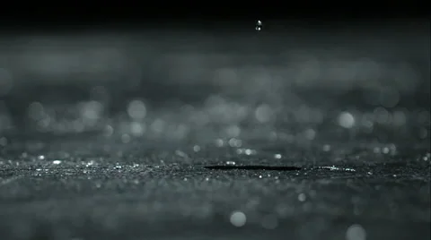 Rain drop falling on ground Stock Footage 46667393