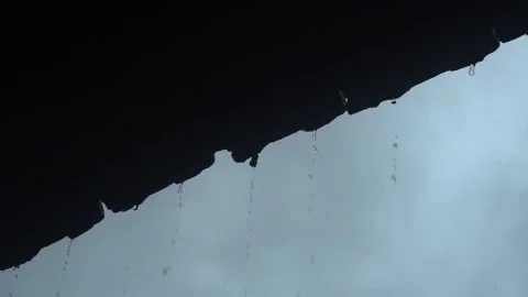 Rain drop falling from old roof tiles Stock Footage 161316162