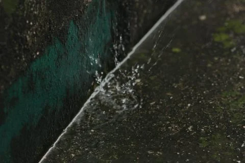 Rain drop on the floor Stock Photos