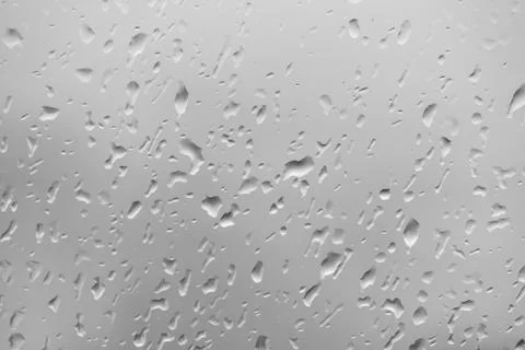 Rain drop on gray background Stock Photos