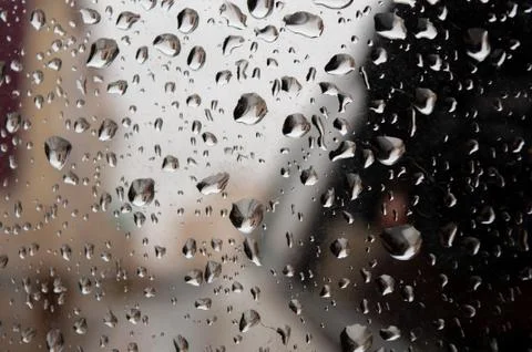 Rain drop on mirror Stock Photos