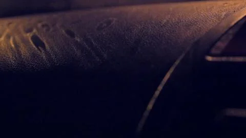 Rain drop shadows on car dash board Stock-Fotos