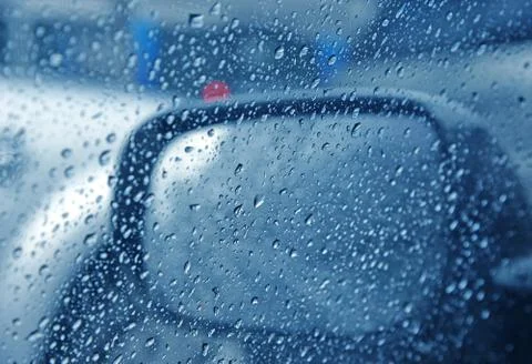 Rain drop on side car window Stock Photos