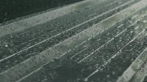 Rain drop water falling splashing on wood terrace Stock Footage 166833178