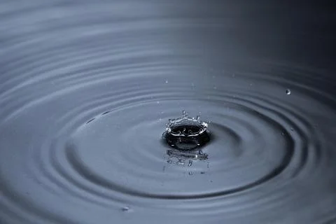 Rain drop water splash Stock Photos