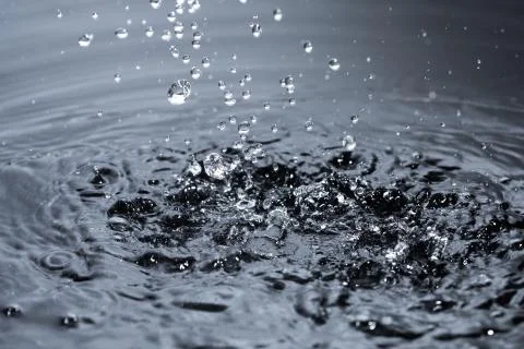 Rain drop water splash Stock Photos