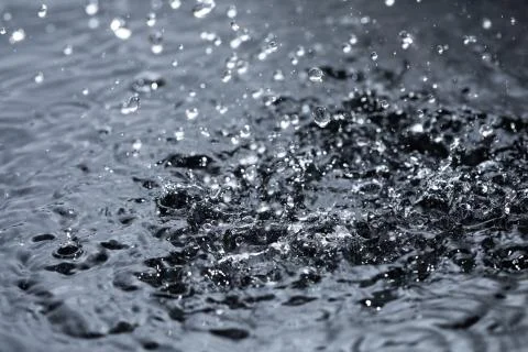 Rain drop water splash Stock Photos