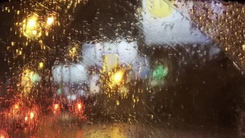 Rain drop on window, rainy day. Heavy downpour on the road. Stock Footage 219726303