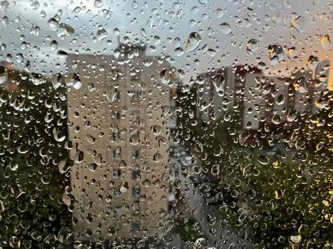 Rain drop on window, rainy day. Stock Photos