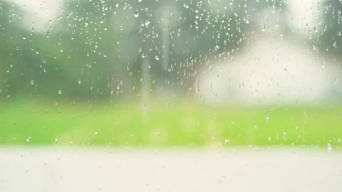 Rain drop on window with softfocus rainy background Stock Footage 251858343