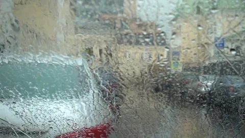 Rain drop on the windshield on the day of rain Stock Footage