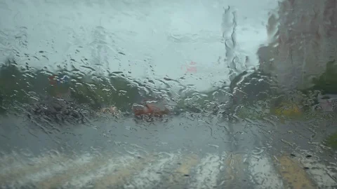 Rain drop on the windshield on the day of rain Stock Footage