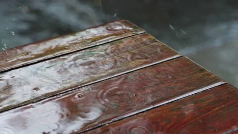Rain drop on wood table or floor Stock Footage 155356031