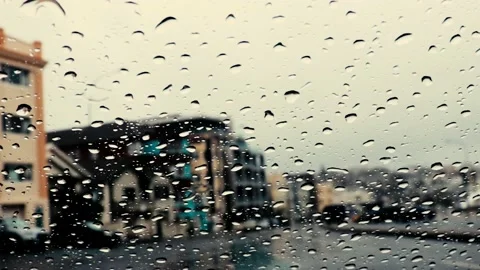 Rain droplets on a car windshield, on a cloudy &amp; rainy day. Fast forward 5x Stock Footage 144464371