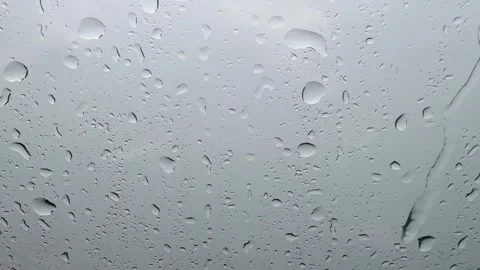 Rain Droplets on Car Windshield During Monsoon Weather Video stock 338040832