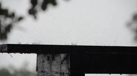 Rain droplets on a table Stock Footage 5945617