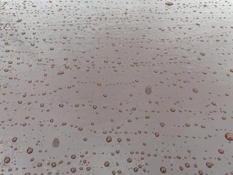 Rain droplets texture on painted metal surface Stock Photos