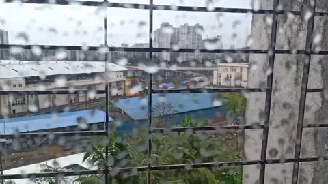 Rain droplets on window glass Stock Footage 134064706