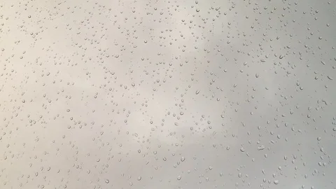 Rain droplets on window or glass. Stock Footage 79435196