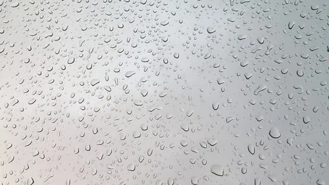 Rain droplets on window or glass. Stock Footage 79435197