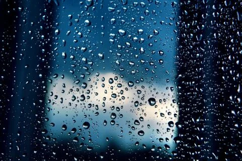Rain droplets on window Stock Photos
