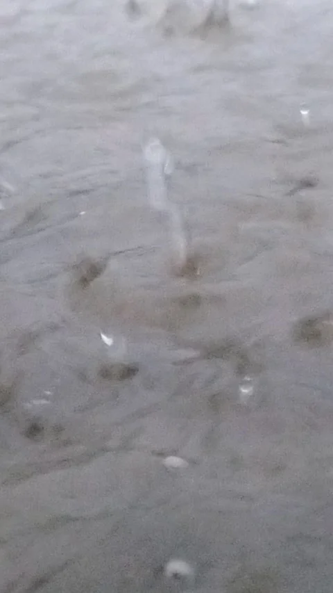 Rain Dropping on Blue Lake. Rainy Season in Tropical Countries. Stock Footage 287779494