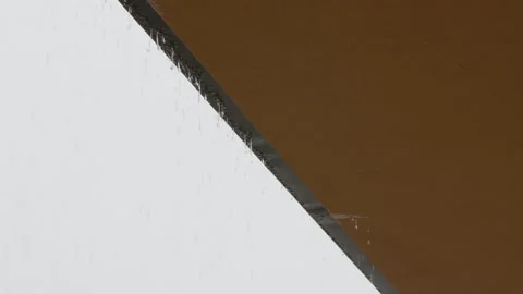 Rain Dropping Down The Gutter Of The Building Stock Footage 288893597