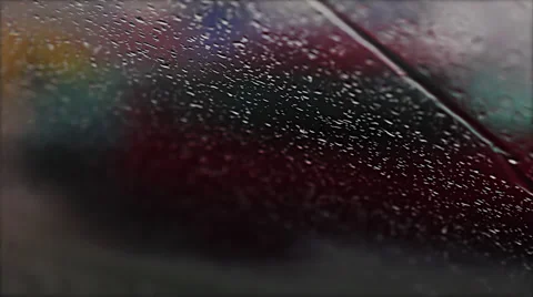 Rain drops and defocused car light Stock Footage 35366987