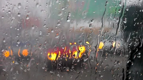 Rain drops and defocused car light Stock Footage 43683322