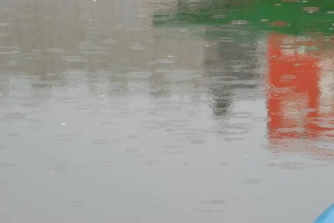 Rain drops and reflection. Stock Photos