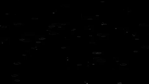Rain Drops and Ripples on Black Background Stock Footage 296664049