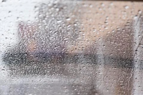 Rain drops on back side glass shield car Stock Photos