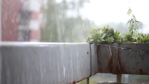 Rain drops on balcony Stock Footage 90304945