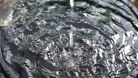 Rain drops in basin Stock Footage 146132694