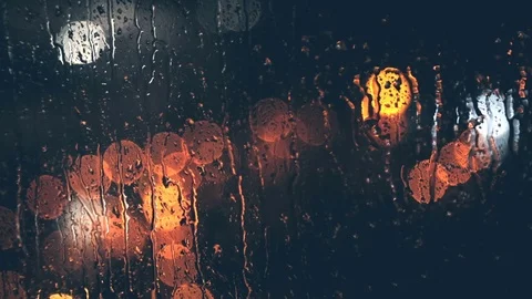 Rain Drops Blown Away by Wind on Window Stock Footage 71759206