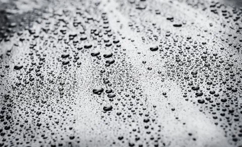 Rain drops on blue background Stock Photos
